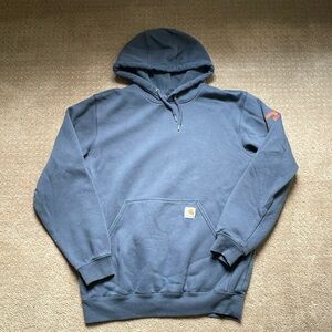 Men’s Blue Carhartt Hoodie Size Medium With Orange “Carhartt” Sleeve Print